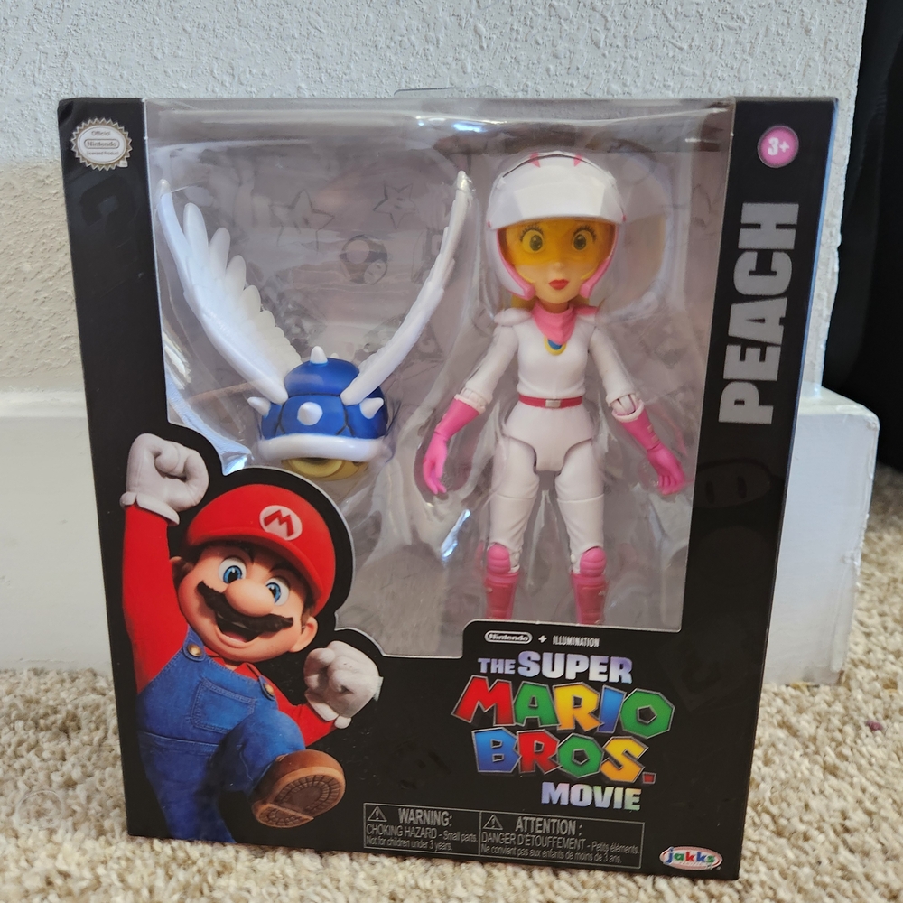 Super Mario Bros Movie Peach Action Figure - White and Pink Suit
